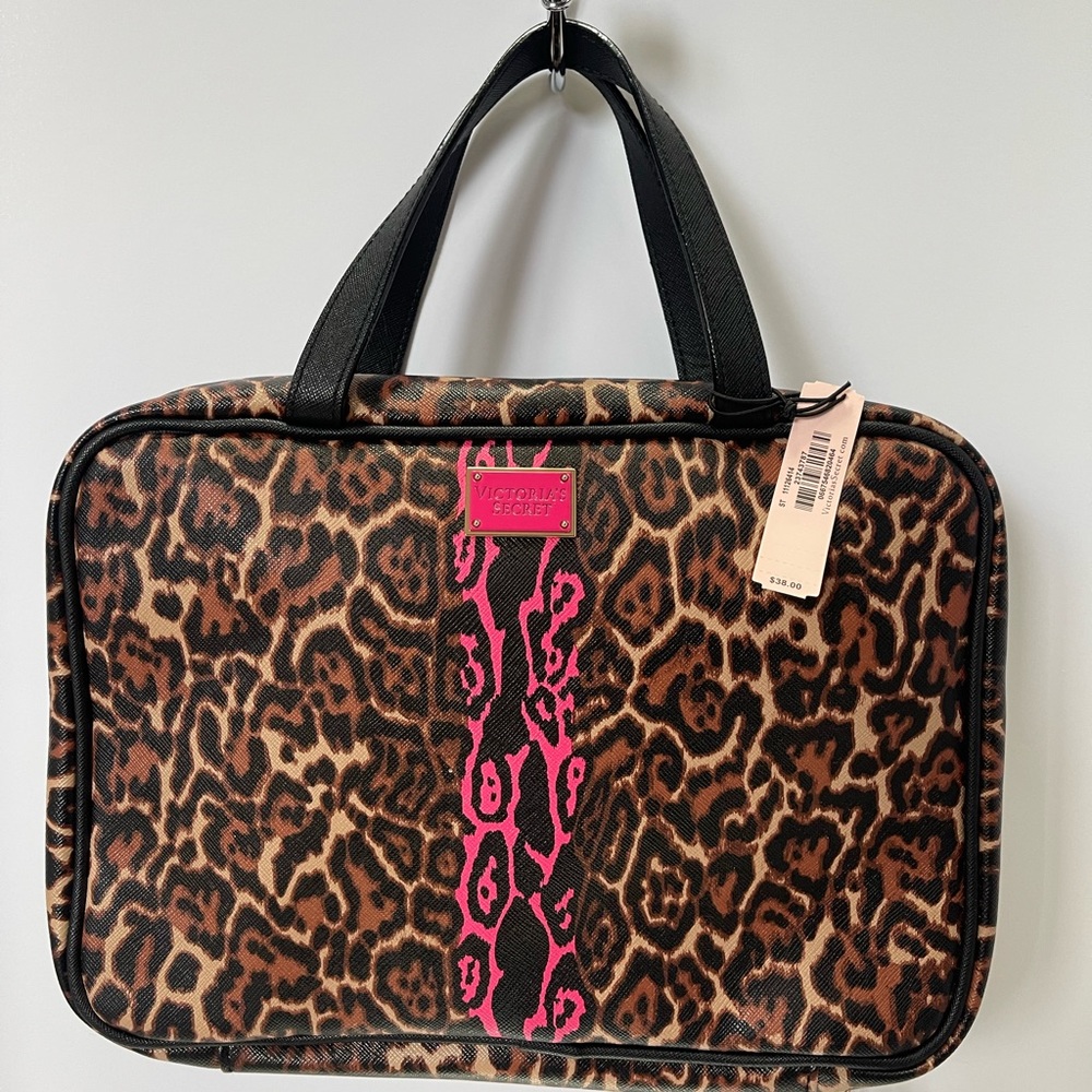 NWT, Victoria’s Secret Animal Print Make-up travel bag with hook & compartments.